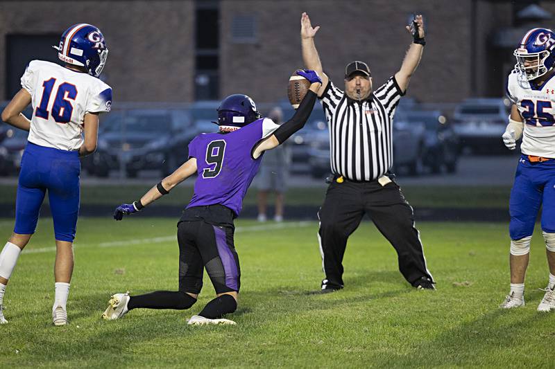 Dixon’s Collin Scott hauls in a touchdown catch Thursday, Sept. 14, 2023 against Genoa-Kingston in a game at Dixon High School.