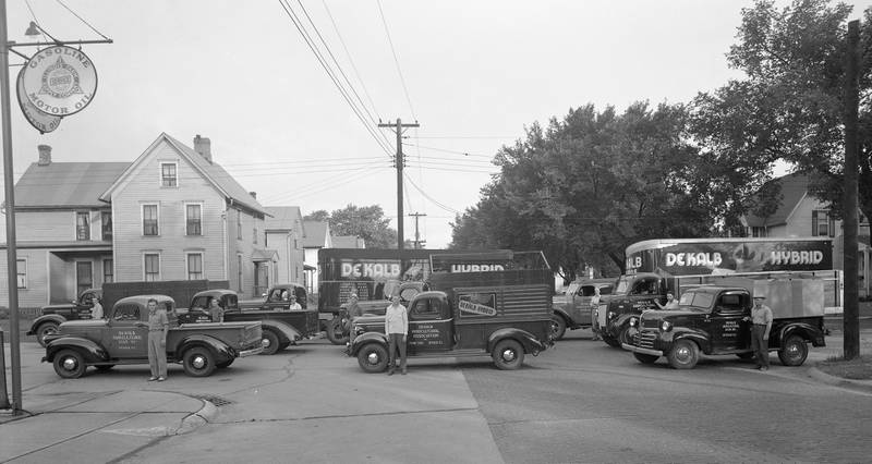 DeKalb Agricultural Association trucks lined up in front of company headquarters at Fifth and Pine streets in DeKalb, 1948.