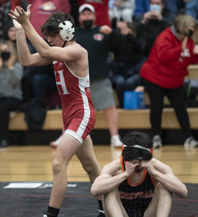 Huntley's Aiden Lira celebrates after winning the 113 pound bout against Crystal Lake Central's Hayden Frankowski on Thursday, January 27, 2022 at Huntley High School.