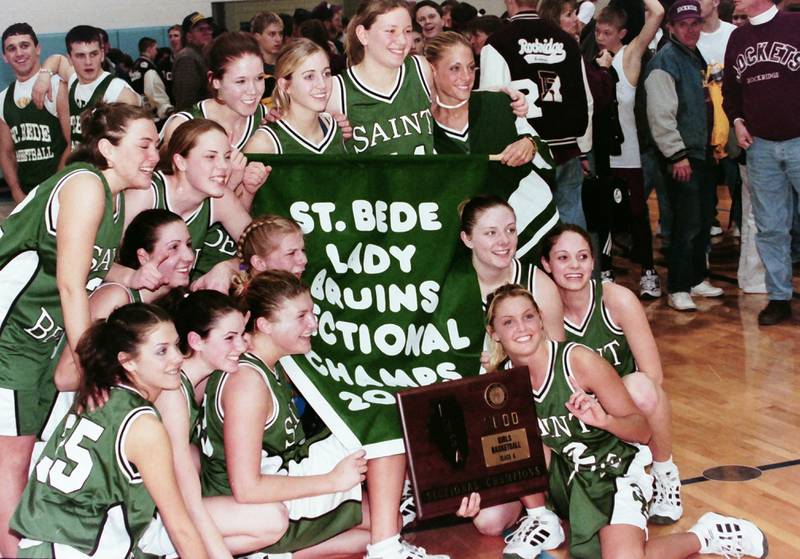 Members of the 2000 St. Bede Lady Bruins celebrate winning the Class 1A Sectional after defeating Rockridge on Feb. 14, 2000 at Bureau Valley High School.