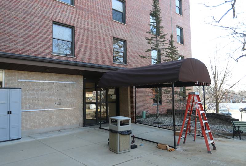 Crews build a canopy awning on the West entrance of the former IVCH and St. Margaret's Hospital on Tuesday, Feb. 20, 2024 in Peru. OSF Healthcare is renovating the building and is planning on re-opening the hospital on Sunday April 7.