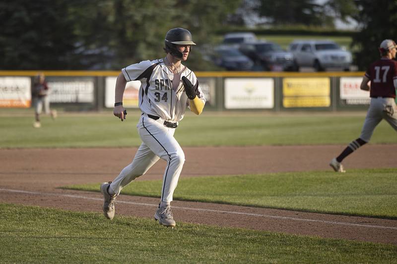 Sycamore’s Davis Collie comes in to score against Morris Monday, June 3, 2024 in the Class 3A Geneseo supersectional.