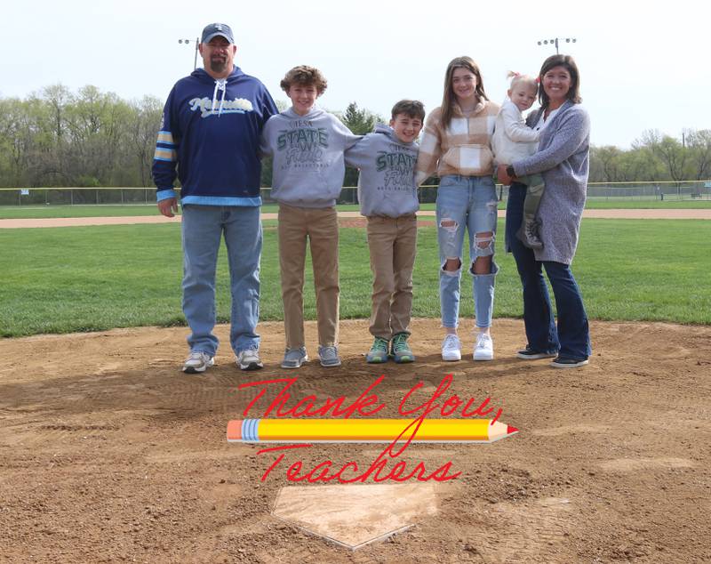 The Hopkins family (from left) Todd, Tate, Ty, Hunter, Tillie and Katie pose for a photo at Masinelli Field on Wednesday, April 19, 2023 in Ottawa.