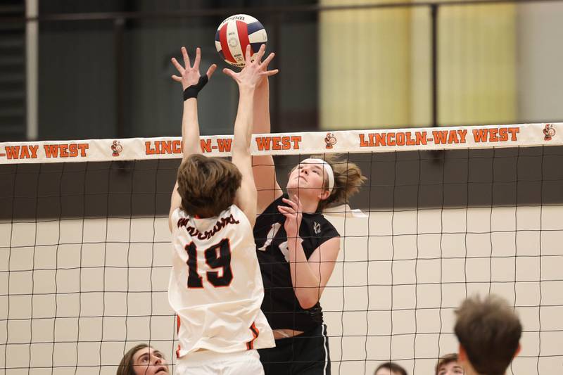 Plainfield North’s Dylan Sherry streches for the shot against Lincoln-Way West on Monday, March 18, 2024 in New Lenox.