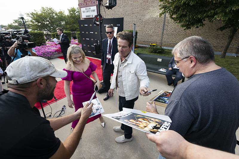 Actor Dennis Quaid stops to sign autographs Thursday, Aug. 22, 2024, before the premier showing of “Reagan.” Quaid was one of three actors portraying Ronald Reagan.