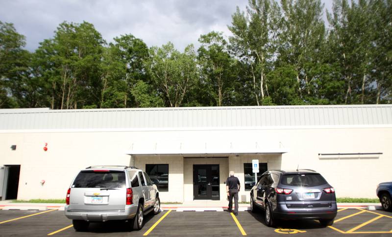 People arrive for an open house at The McHenry County Regional Training Center in Cary Tuesday evening.