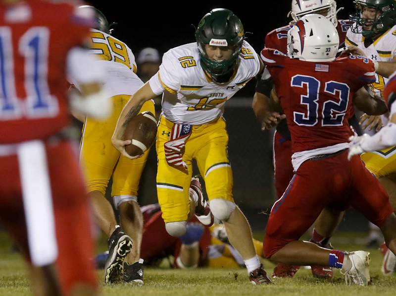 Crystal Lake South's Aidan Neyt runs with the ball during a Fox Valley Conference football game against Dundee-Crown on Friday, Aug 30, 2024, at Dundee-Crown High School in Carpentersville.