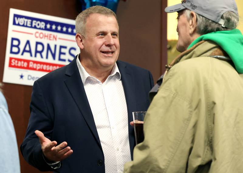 Cohen Barnes, DeKalb mayor and candidate for the democratic nomination for the 76th district seat in the Illinois House of Representatives, talks to supporters Tuesday, March 19, 2024, during his election night party at Faranda’s in DeKalb.