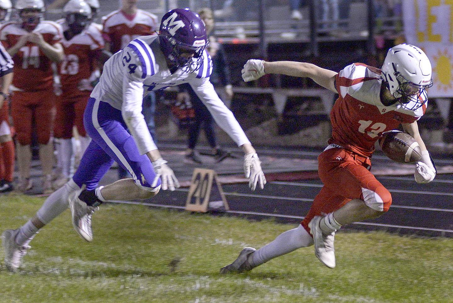 Streator’s Anthony Mohr works the sideline to get past Manteno’s Nathan Hope during a 2023 game at Doug Dieken Stadium in Streator.