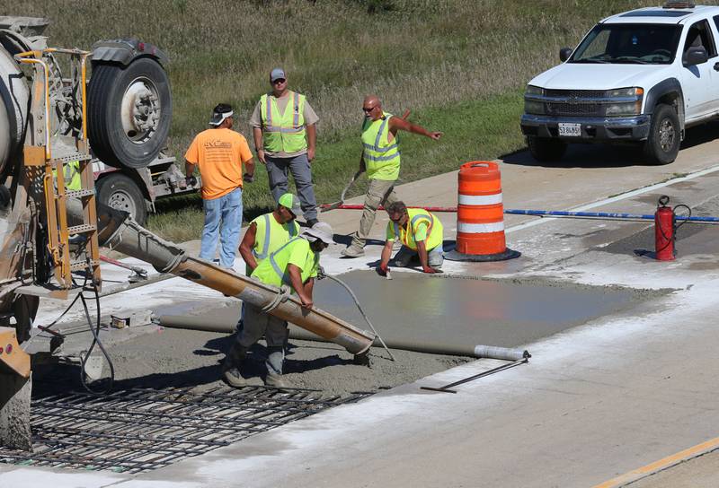 Crews pour a section of concrete Tuesday, Sept. 3, 2024, while doing patch work on Interstate 39 between Lostant and Tonica. The Illinois Department of Transportation will be do joint and pothole repair through November. Motorists are asked to use caution and expect delays when traveling through the work zones. The project is part of the Rebuild Illinois investing $33.2 billion into all modes of transportation across the state.