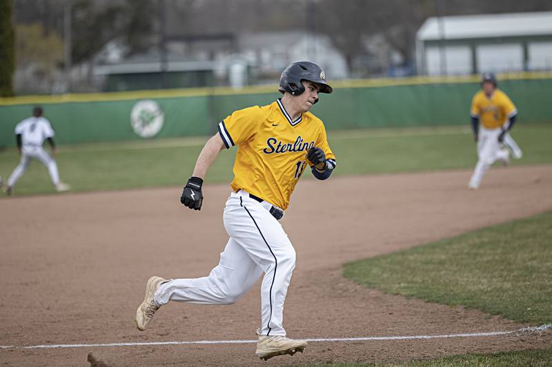 Sterling’s Mason Smithee rounds third base to score against Rock Falls Friday, March 29, 2024 at Rock Falls High School.