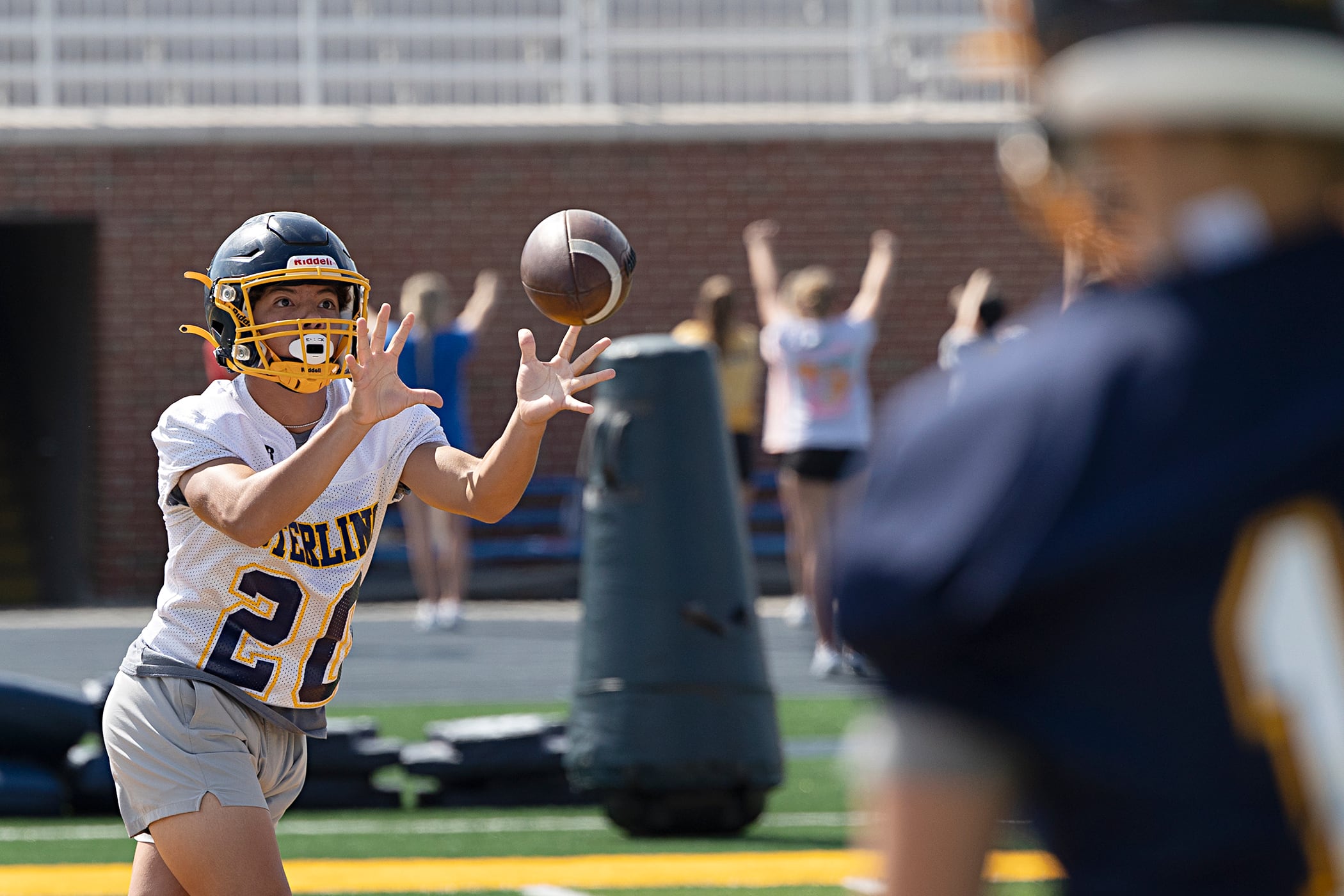 Sterling’s Emmanuel Arreola hauls in a pass Tuesday, Aug. 13, 2024 during football practice.