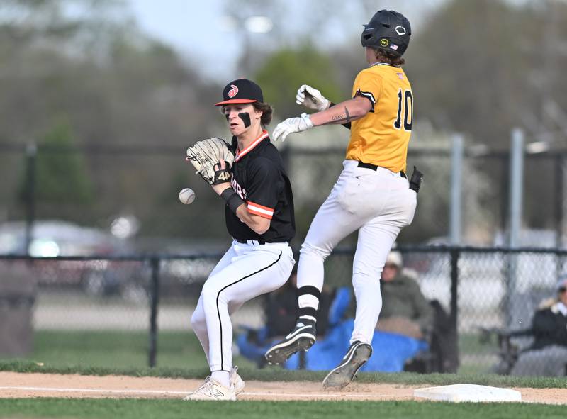 Lincoln-Way West's Lucas Acevedo tries to make a play at first base during the non-conference game against Joliet West on Friday, April. 19, 2024, at Joliet.