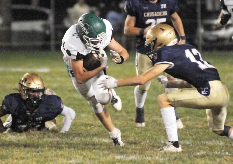 Marquette's Ben Walker tackles Seneca's Brody Rademacher at Gould Stadium on Friday, Sept. 13, 2024.