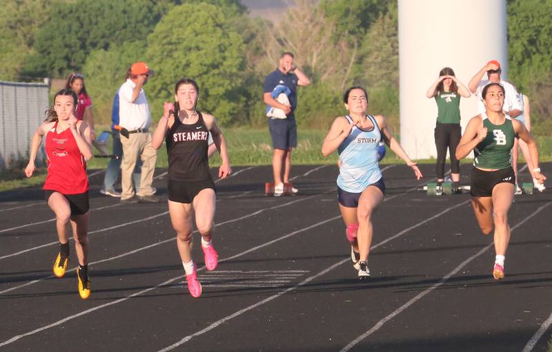 Henry-Senachwine's Daniella Bumber, Fulton's Brooklyn Thoms, Bureau Valley's Connie Gibson and St. Bede's Emerald De La Torre compete in the 100 meter dash during the Class 1A Sectional meet on Wednesday, May 8, 2024 at Bureau Valley High School.