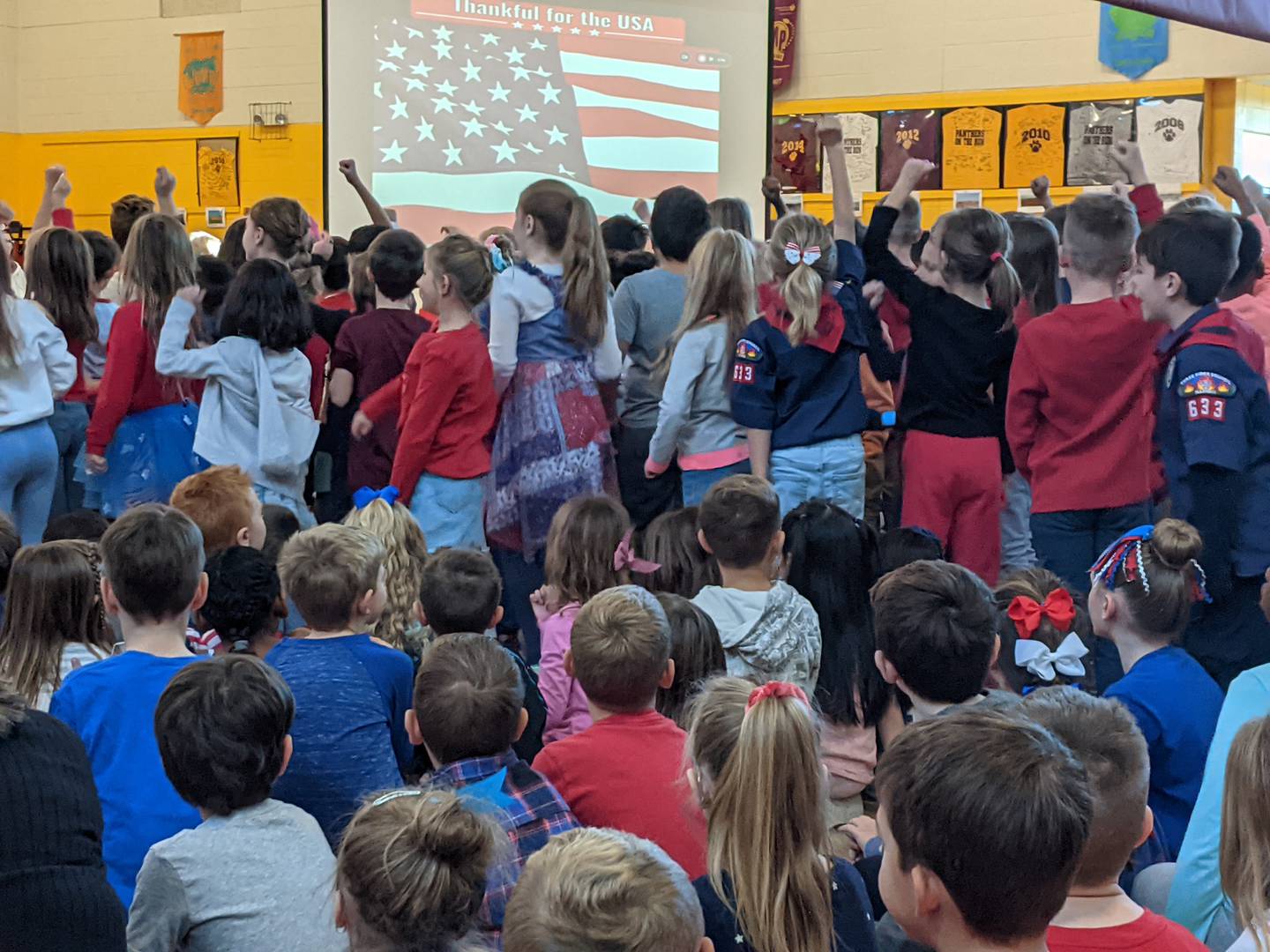 Students at Prairie Point Elementary School in Oswego sang patriotic songs as part of a Veterans Day assembly Friday morning.