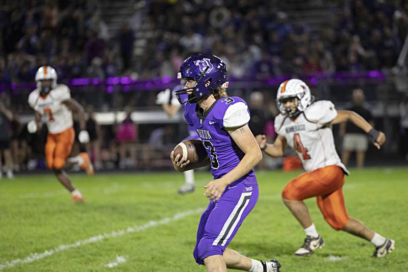 Dixon’s Tyler Shaner looks for running room against Winnebago Friday, Sept. 29, 2023 in Dixon.