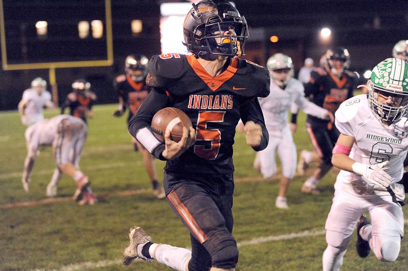 Sandwich's Cole Leeper returns a Ridgewood kickoff for a touchdown during a varsity football game at Sandwich High School on Friday, Oct. 27, 2023.