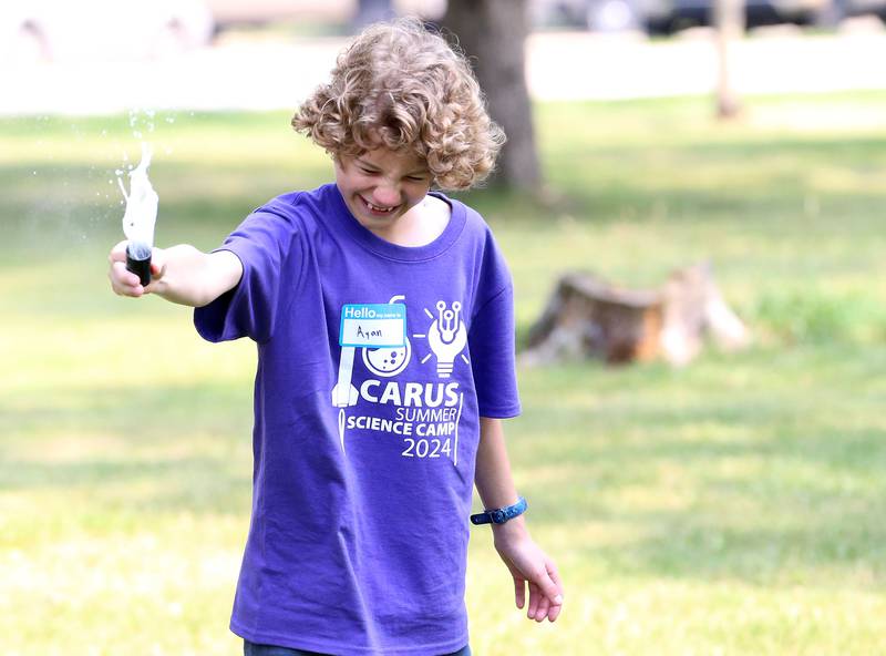 Ryan Spayer lets go of his cap water rocket during the 22nd annual Carus Summer Science Camp on Friday, July 12, 2024 at St. Bede Academy.