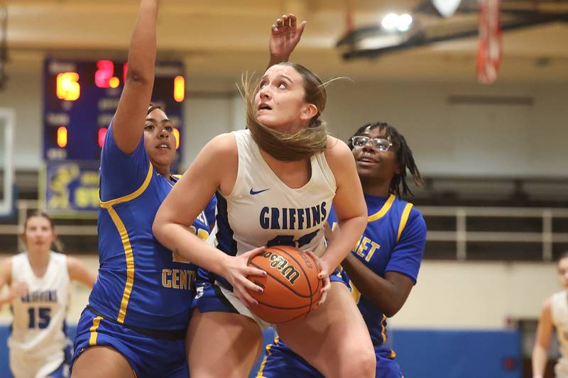 Lincoln-Way East’s Hayven Smith works under the basket against Joliet Central in the Class 4A Joliet Central Regional semifinal on Feb. 13th, 2024 in Joliet.