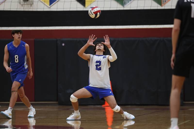 Lincoln-Way East’s Madan Sundaram receives the serve against Plainfield North on Tuesday, April 2, 2024.