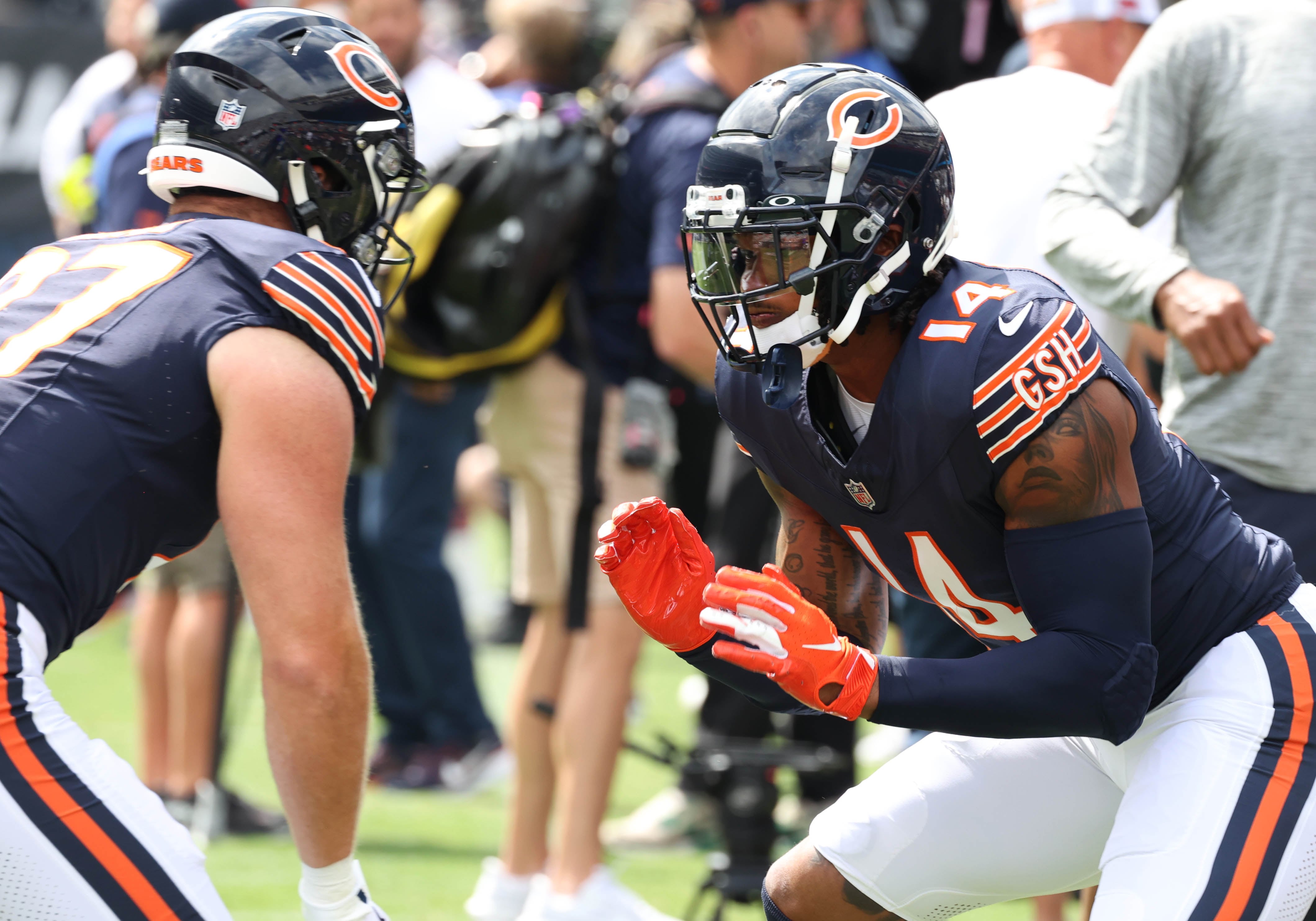 Chicago Bears tight end Gerald Everett (right) does a pregame drill with tight end Brenden Bates before their game with the Cincinnati Bengals Saturday, Aug. 17, 2024, at Soldier Field in Chicago.