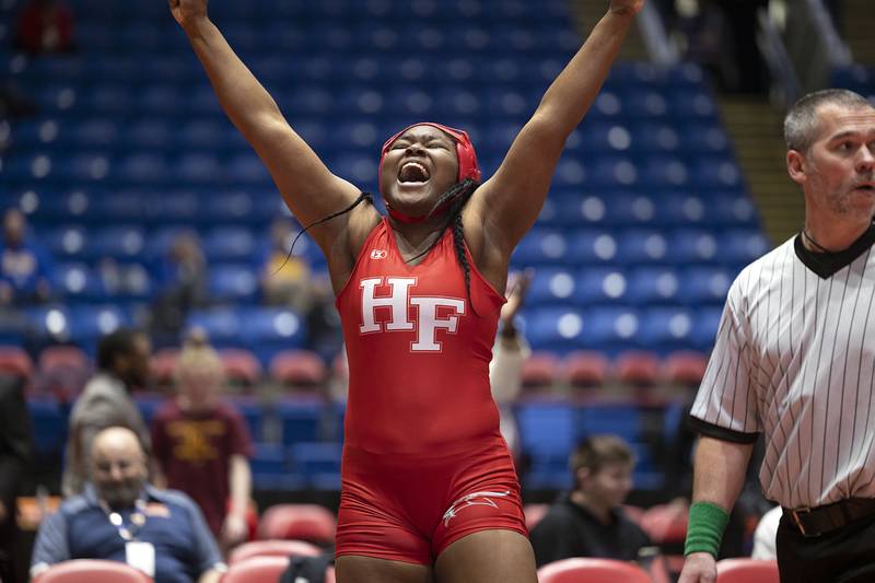 Ini Odumosu of Homewood-Flossmor celebrates the 190 pound championship match at the IHSA girls state wrestling championships Saturday, Feb. 25, 2023.