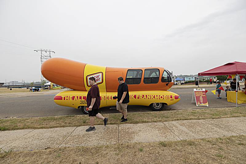 The Frankmobile, the wandering weiner of the Oscar Mayer company, makes a stop at RB&W park in Rock Falls Friday, June 30, 2023. The group will head to the Quad Cities after their stop in Rock Falls.