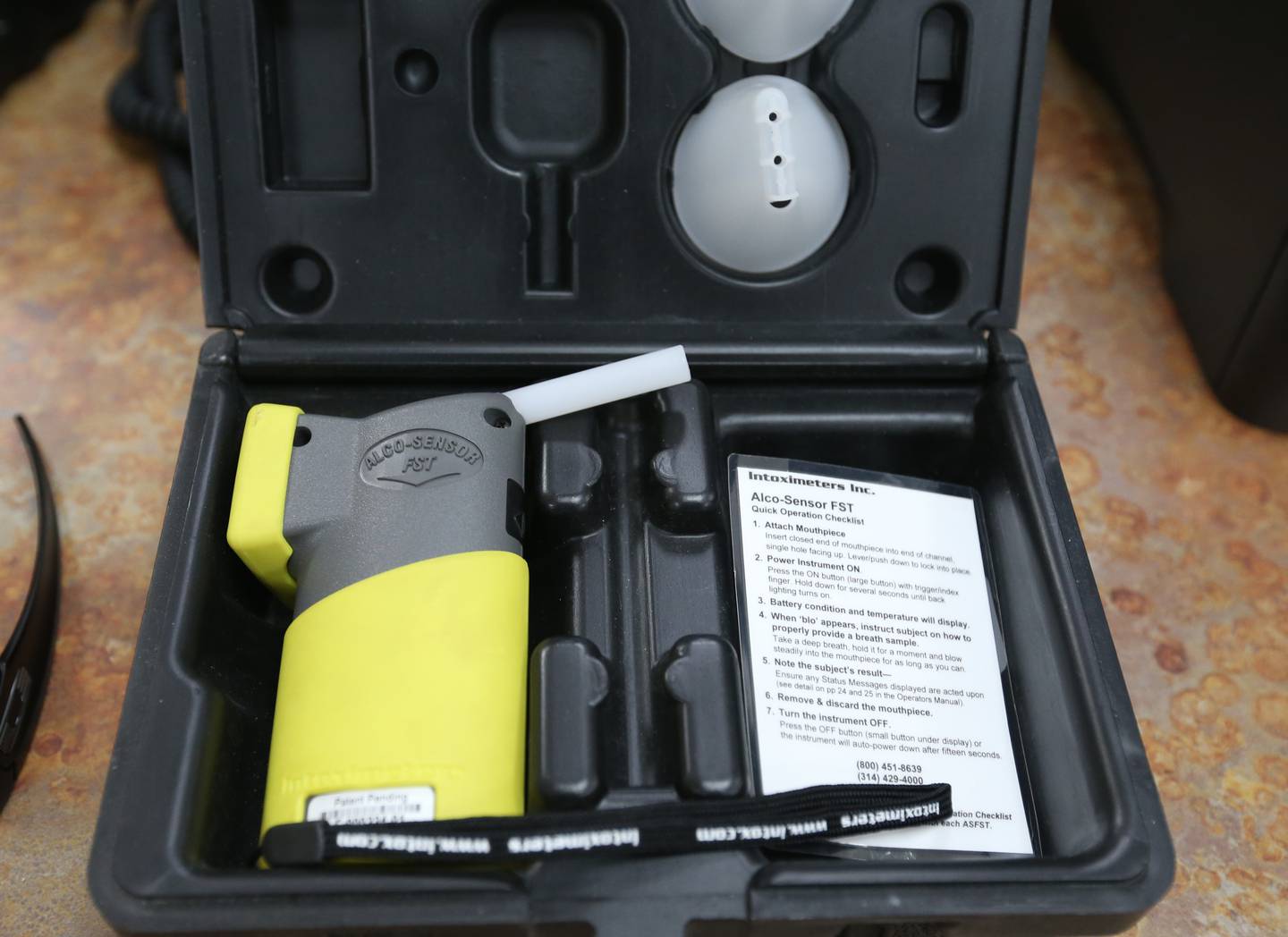 A portable breathalyzer detector is enclosed in a case inside the Utica Police Station on Tuesday, June 27, 2023.