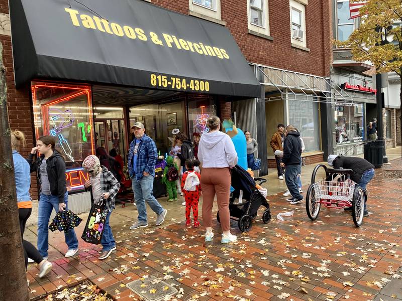 Costume-clad families took downtown DeKalb by storm Thursday, Oct. 26, 2023 for the 26th annual Spooktacular trick-or-treating event hosted by the DeKalb Chamber of Commerce.