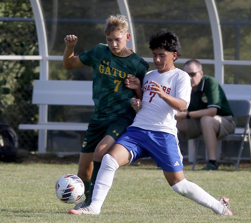 Crystal Lake South's Will Prus battles with Dundee-Crown's Hugo Arista for control of the ball during a Fox Valley Conference soccer match on Tuesday, Sept. 10, 2024, at Crystal Lake South High School.