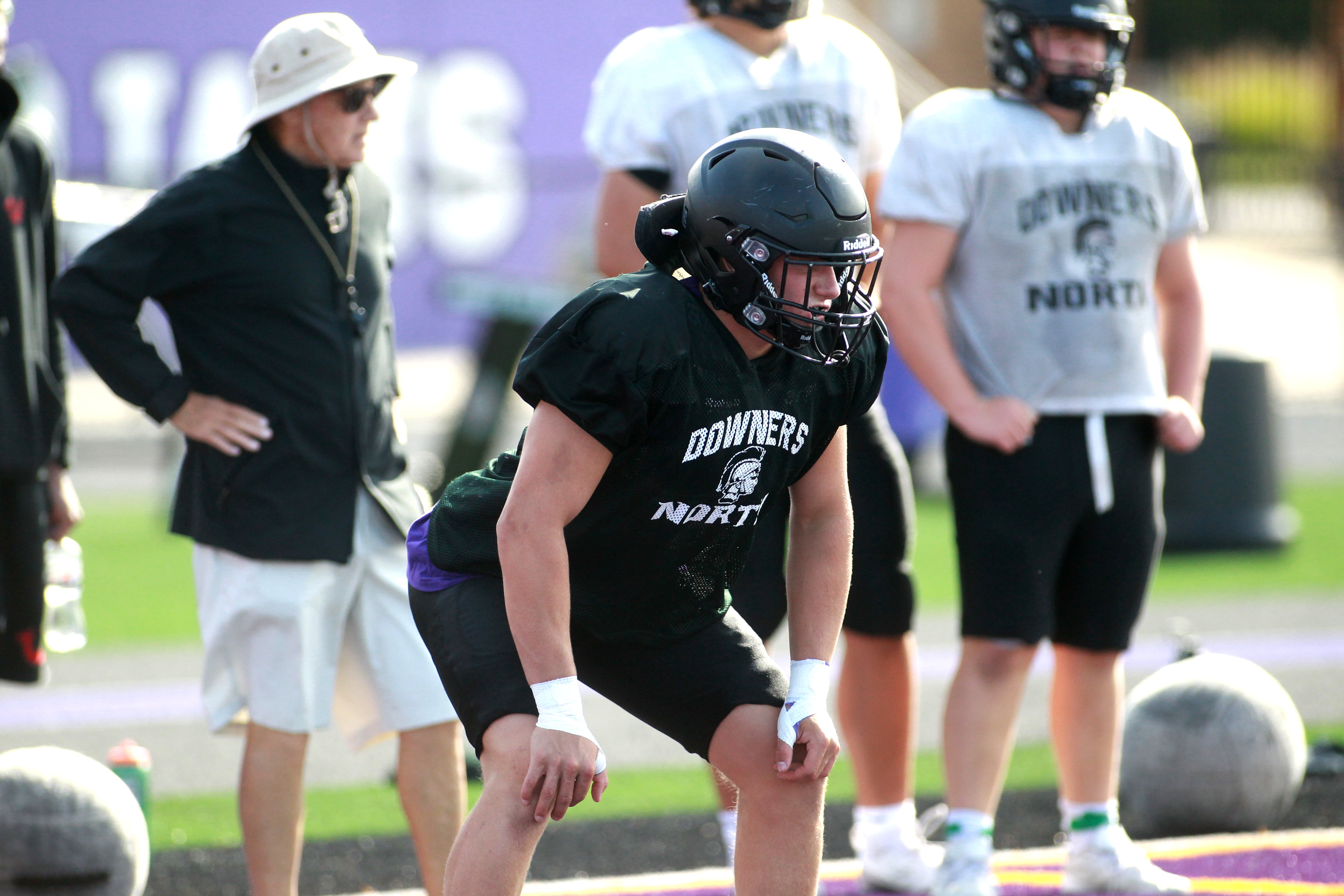 Downers Grove North’s Jake Gregorio lines up for a play during a practice on Tuesday, Aug. 20, 2024 at the school.