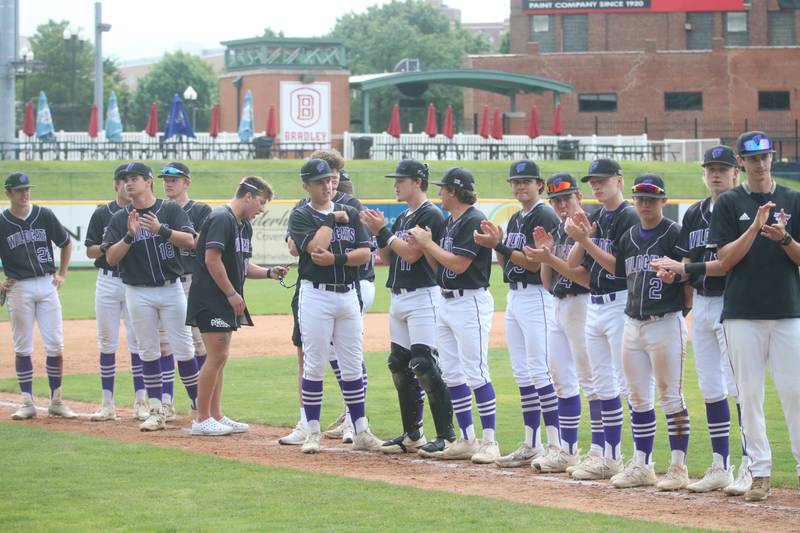 Members of the Wilmington baseball team applaud as they receive their third place medals during the Class 2A third place game on Saturday, June 1, 2024 at Dozer Park in Peoria.