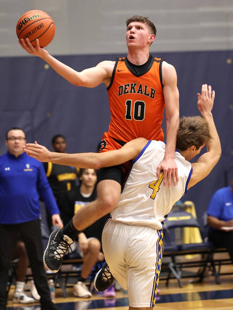 DeKalb’s Eric Rosenow is fouled by Warren's Jack Wolf Tuesday, Feb. 27, 2024, during their Class 4A sectional semifinal game at Rock Valley College in Rockford.