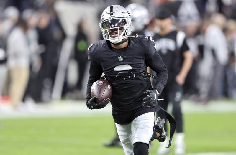 Las Vegas Raiders wide receiver DeAndre Carter (3) warms up before an NFL football game against the Los Angeles Chargers in December 2023 in Las Vegas.