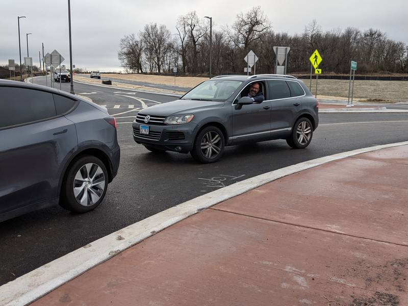 SD308 Superintendent Andalib Khelghati tries out the new roundabout on Wolfs Crossing in Oswego that opened on Dec. 29.