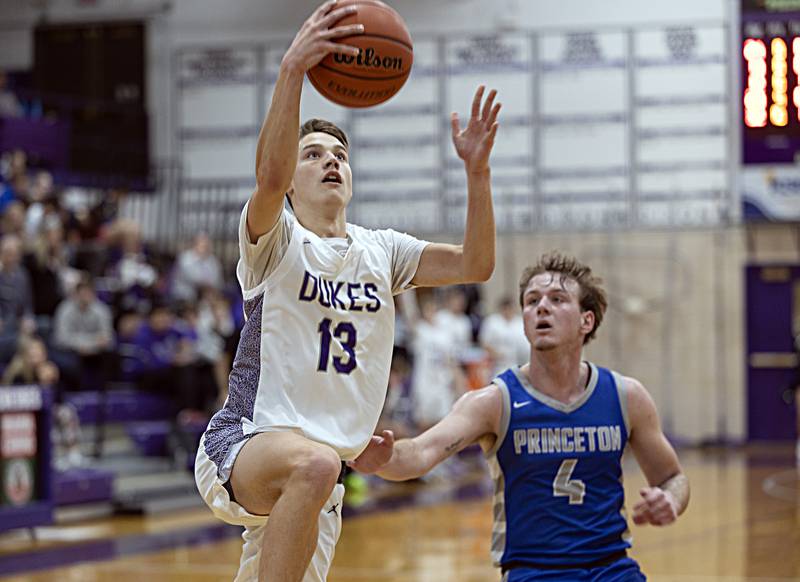 Dixon’s Cullen Shaner puts in a lay-up at the end of the first quarter against Princeton Thursday, Dec. 21, 2023 at Dixon High School.