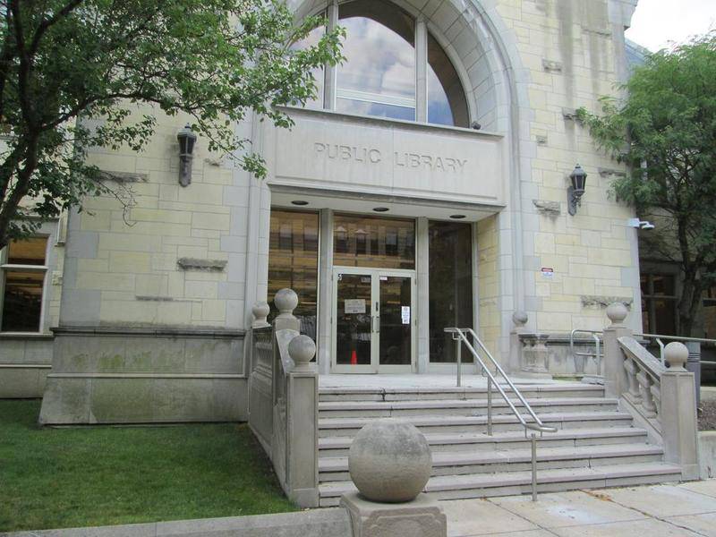 The Chicago Street entrance to the Joliet Public Library building downtown would be reopened as one feature in a $10.5 million remodeling project under consideration.