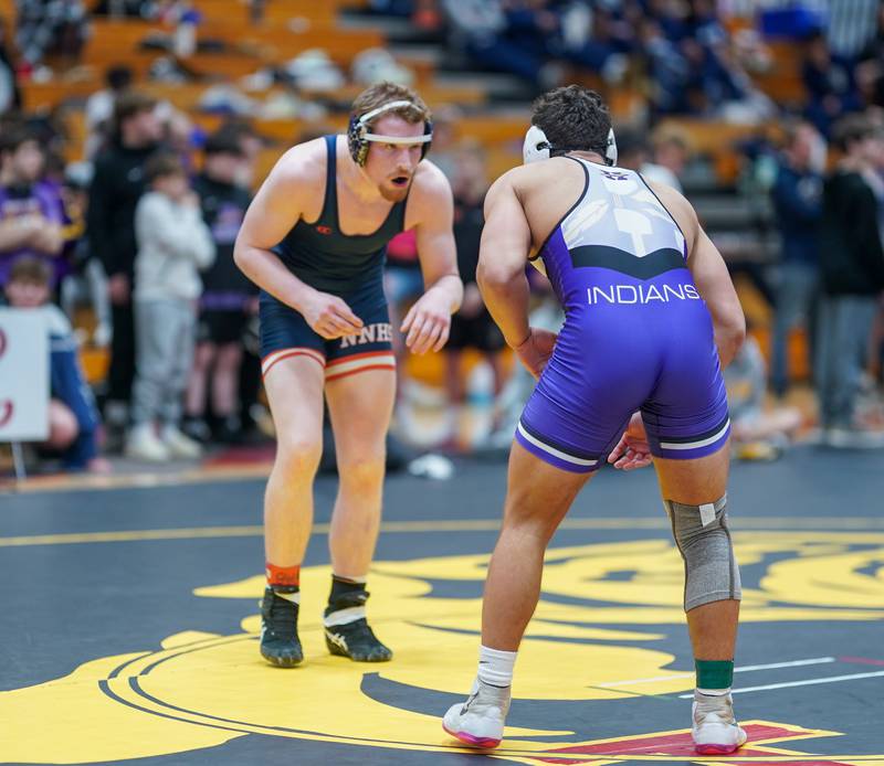 Naperville North’s Kyle Gatlin circles the mat against Hononegah’s Kurt Smith In a 175-pound championship match during The Clint Arlis Invitational Wrestling meet at Batavia High School in Batavia on Saturday, Jan 13, 2024.