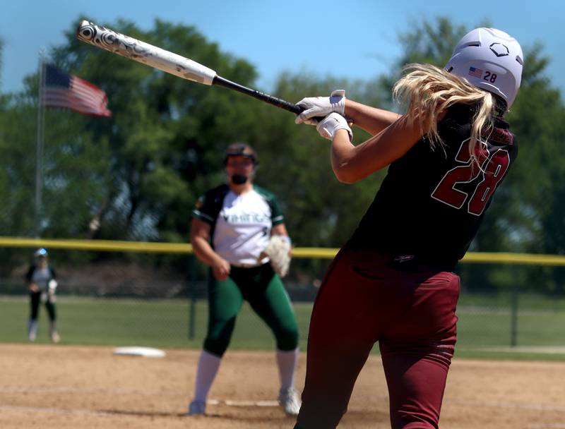Richmond-Burton’s Madison Kunzer makes contact against North Boone during Class 2A softball sectional final action at Marengo Saturday.