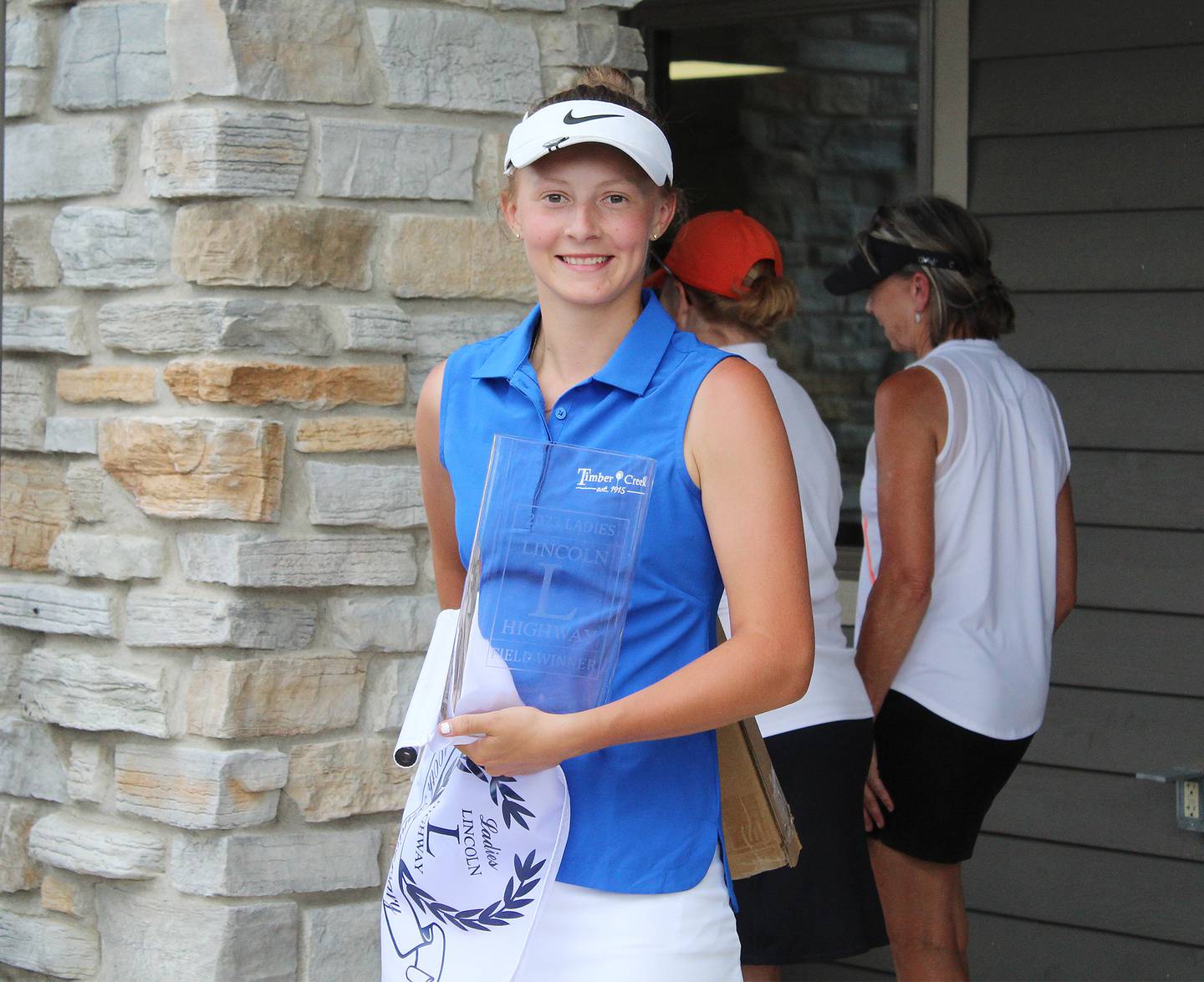 Katie Drew of Timber Creek Golf Course in Dixon poses with her championship trophy Saturday, July 8, 2023, at the Women’s Lincoln Highway Tournament at Lake Carroll Golf Course in Lanark. Drew won medalist honors for the forst time with a +31, one point better than teammate Mandy Hinkey and Kishwaukee’s Kim Kester.