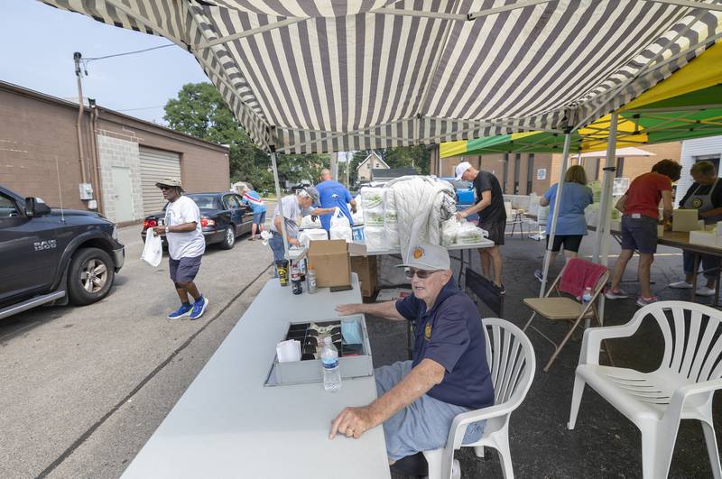 Mike Wolber handles the money Monday, Aug. 5, 2024, for the Sterling American Legion’s chicken barbecue. Wolber arrived on scene at 4:45 a.m. to get things going for the fundraiser.