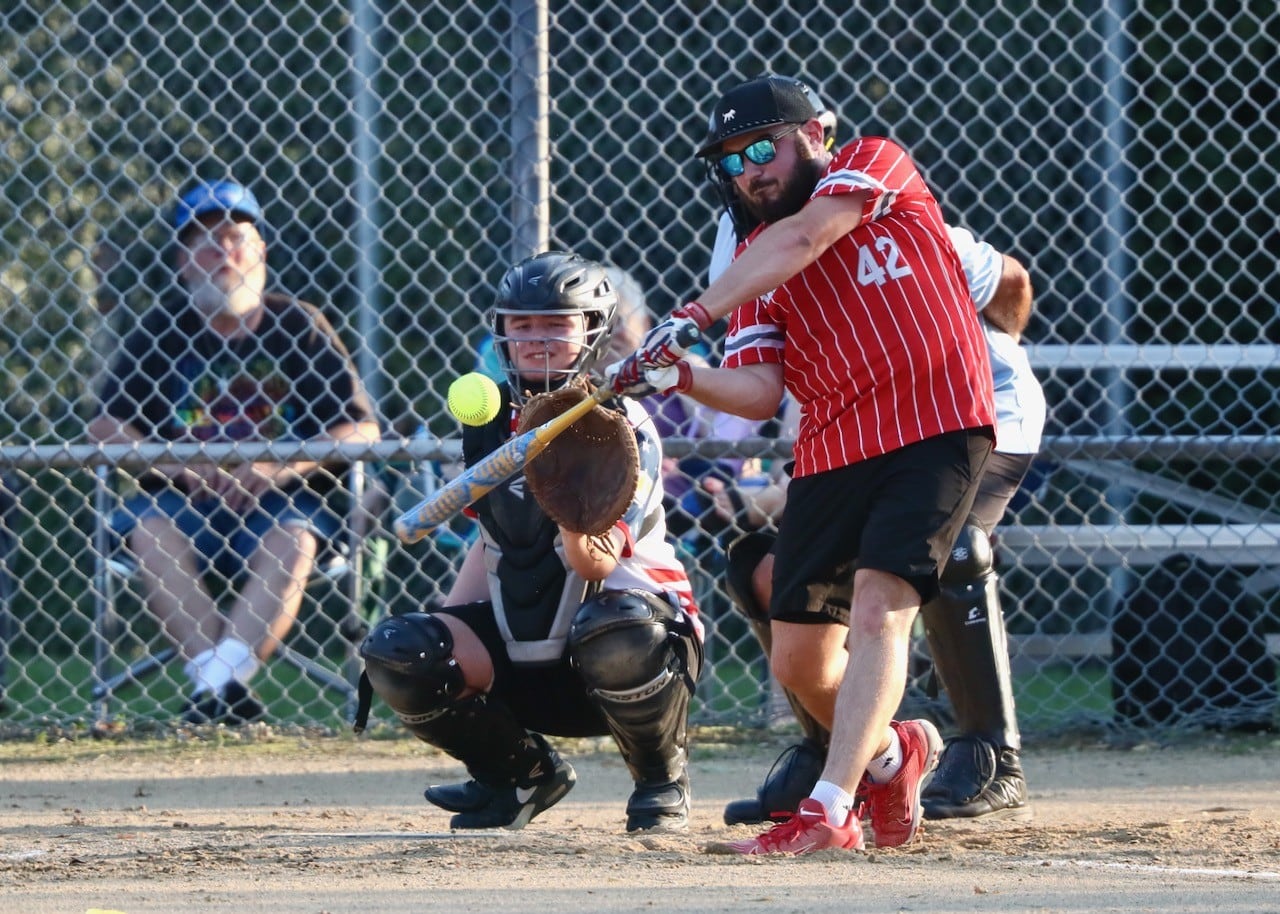 Colton Kuhne of Malden Methodist takes his cuts in Friday's Princeton Park District Fastpich League tournament play at Westside Park.