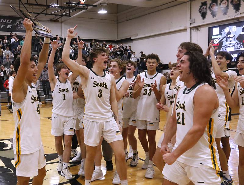 Crystal Lake South players celebrate their win over Kaneland in the IHSA Class 3A Kaneland Boys Basketball Sectional championship game on Friday, March 1, 2024, at Kaneland High School in Maple Park.