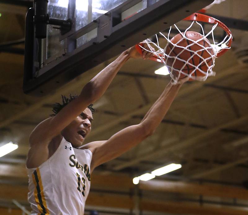 Crystal Lake South's Christian Rohde dunks the ball during a IHSA Class 3A Kaneland Sectional semifinal against Freeport on Feb. 27, 2024, at Kaneland High School in Maple Park.