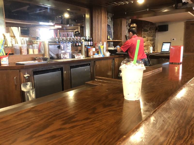 A milkshake sits on the counter of Pop-a-doodle-doo in Woodstock Aug. 17, 2024.