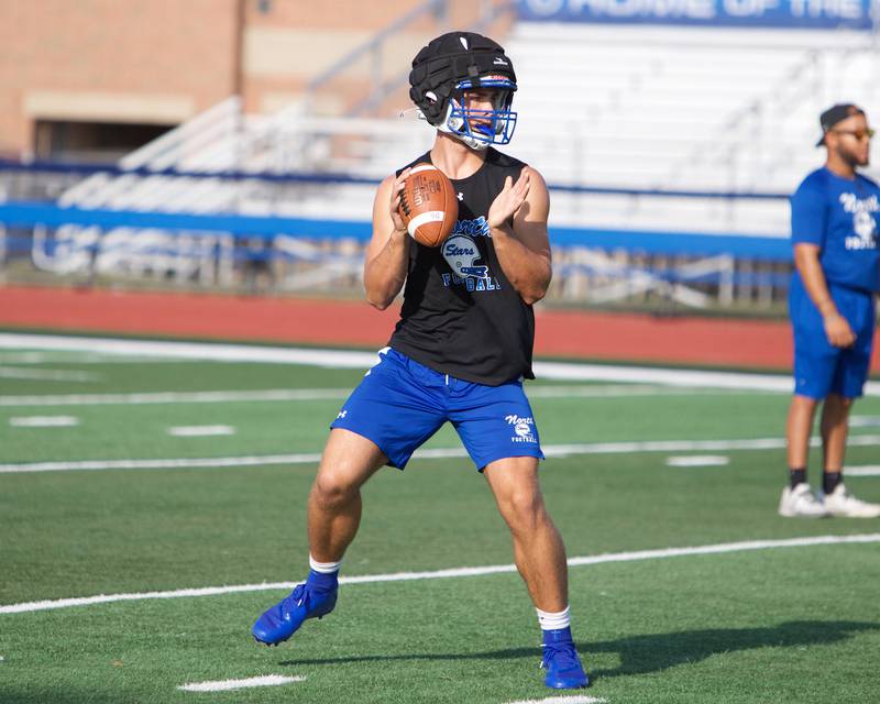 St. Charles North's Ethan Plumb practices throws during the first day of practice on Monday Aug.12,2024 in St. Charles.