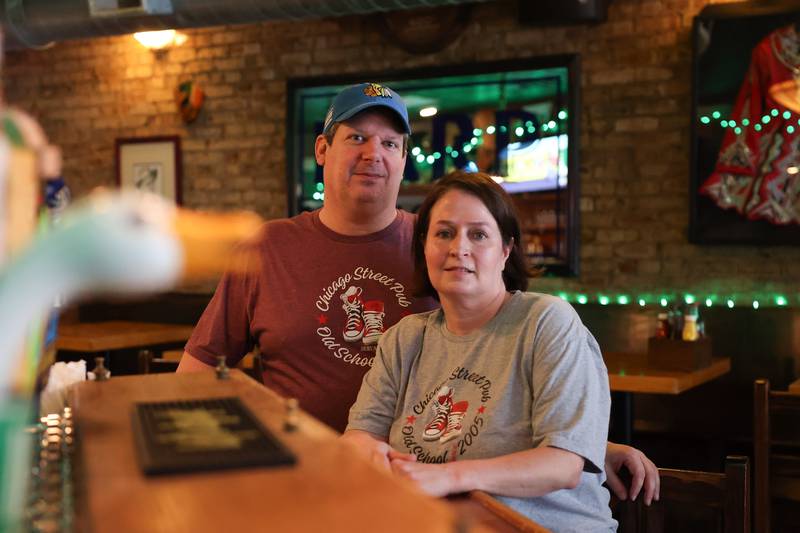 Mike and Kathy Trizna pose for a photo at their Chicago Street Pub located in downtown Joliet on Thursday May 30, 2024.