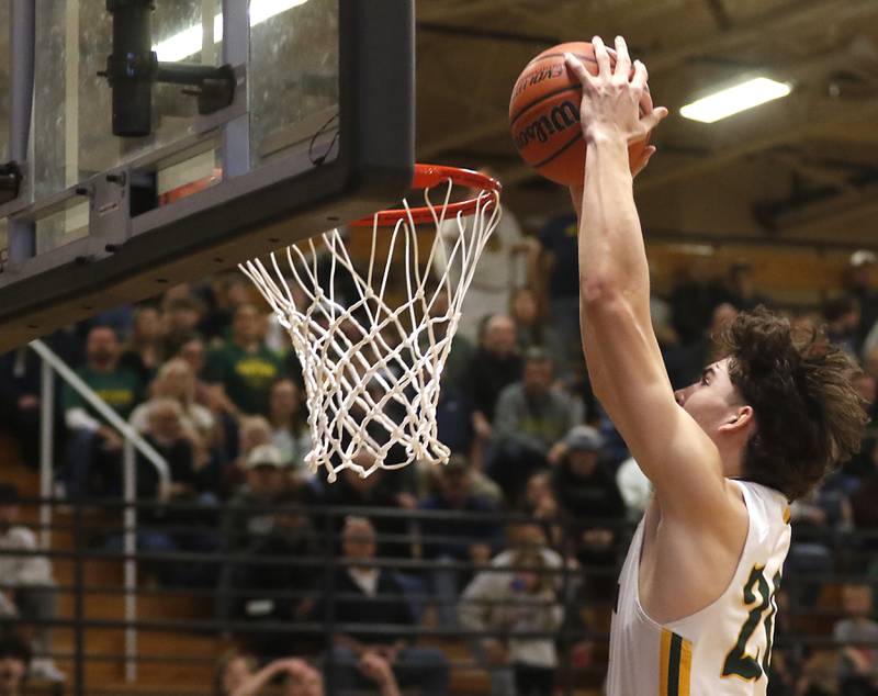 Crystal Lake South's Christopher Regillio dunks the ball during the IHSA Class 3A Kaneland Boys Basketball Sectional championship game against Kaneland on Friday, March 1, 2024, at Kaneland High School in Maple Park.