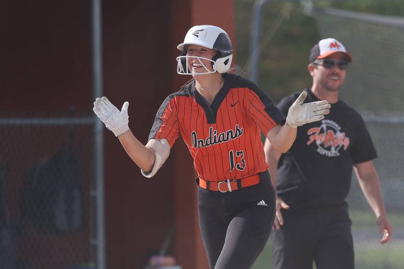Minooka’s Gracie Anderson celebrates as she heads to the plate after her two run home run against Normal in the Class 4A sectional semifinal on Tuesday, May 21, 2024 in Minooka.